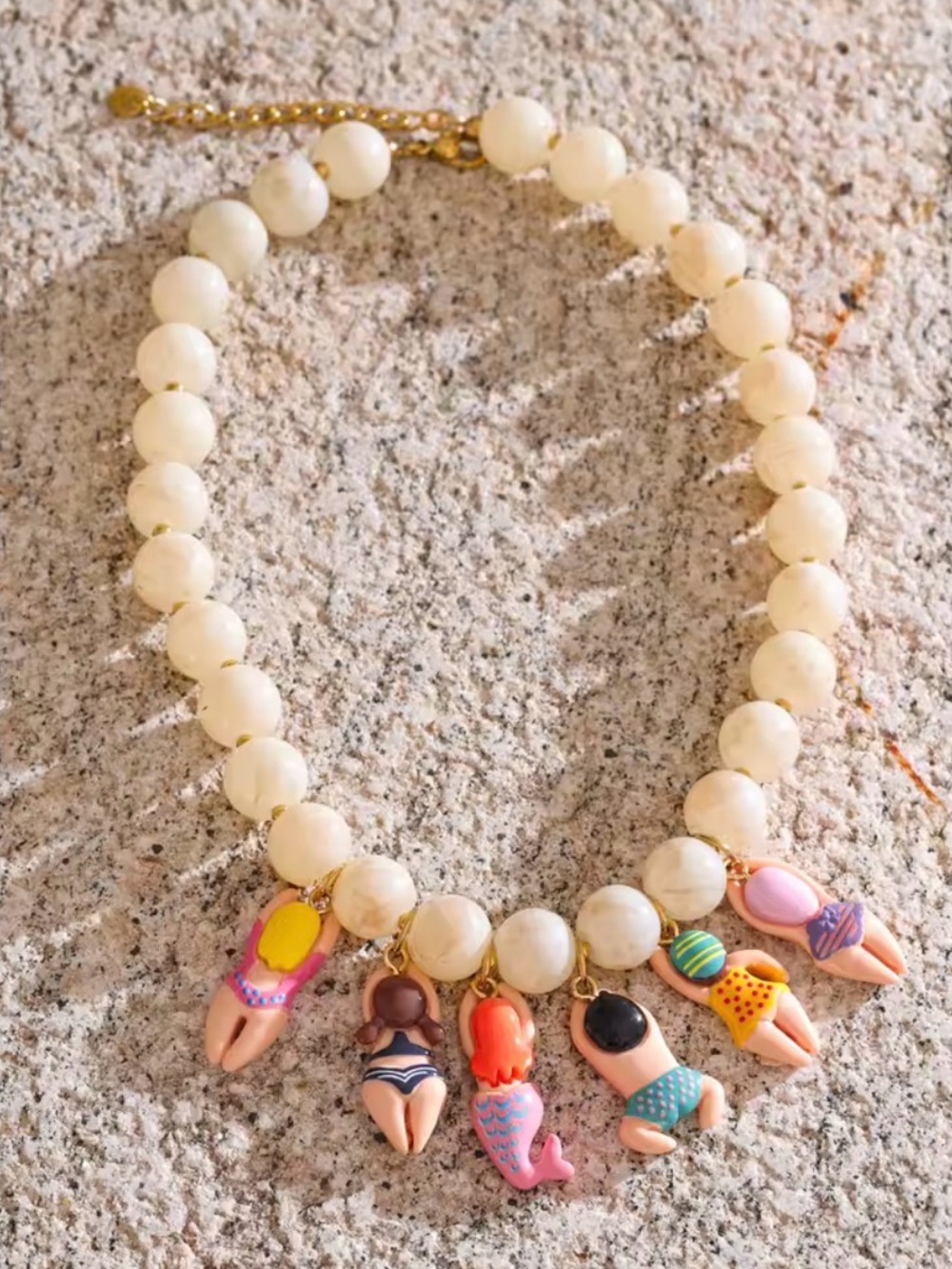 Cream Beaded Necklace with Multicolor Bikini Girl Charms